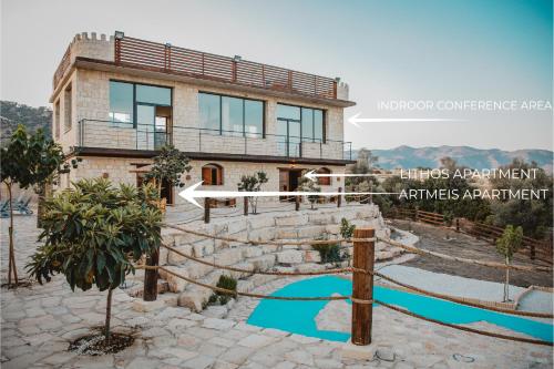 a villa with a view of a house at Kleos Noble Retreat - Private Estate in Limassol