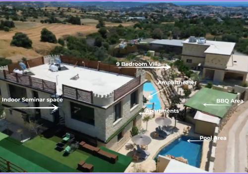 arial view of a house with a map at Kleos Noble Retreat - Private Estate in Limassol