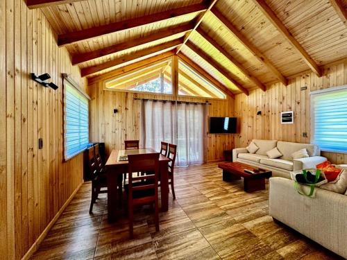 Televiisor ja/või meelelahutuskeskus majutusasutuses Cabañas Prado Verde, Llifén