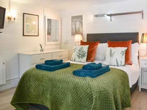 Ένα ή περισσότερα κρεβάτια σε δωμάτιο στο Lama Lodge