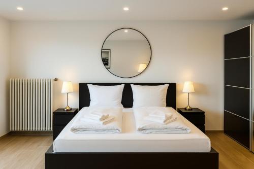 Ένα ή περισσότερα κρεβάτια σε δωμάτιο στο Alpenpanorama Renoviertes Apartment mit Bergblick