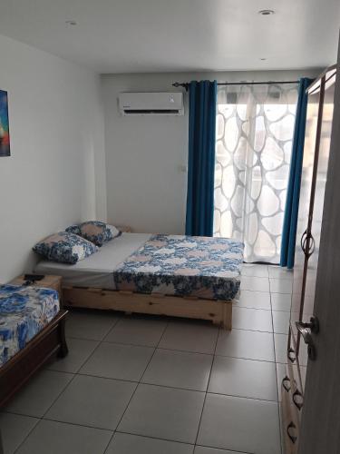 Katil atau katil-katil dalam bilik di Houcine appartement