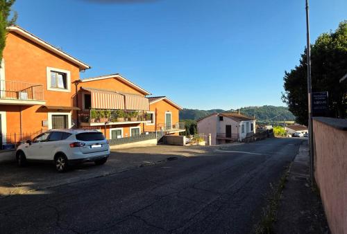 a car parked on the side of a street at Casa Adelaide - A stone's throw from Rome in Gavignano