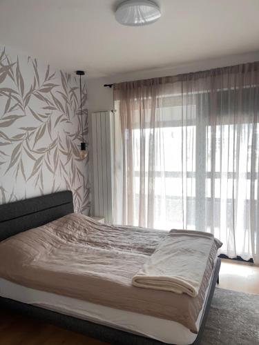 Postel nebo postele na pokoji v ubytování Adena