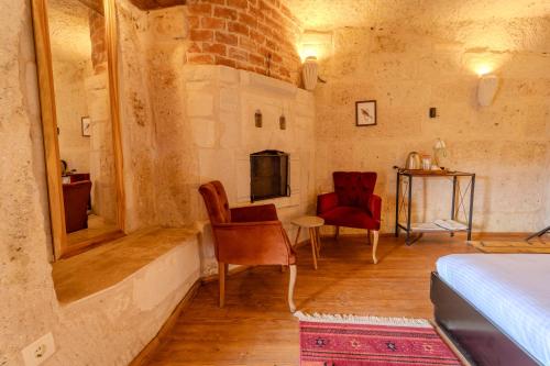 Postel nebo postele na pokoji v ubytování Valinor Cappadocia