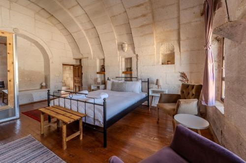 Postel nebo postele na pokoji v ubytování Valinor Cappadocia