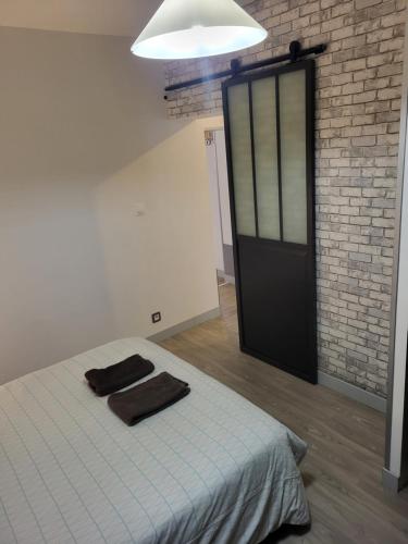 Postel nebo postele na pokoji v ubytování Petite maison cosy wifi avec terrasse