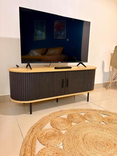 Μια τηλεόραση ή/και κέντρο ψυχαγωγίας στο Cocon des îles, proche aéroport