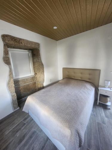 Postel nebo postele na pokoji v ubytování A Casa da Aldeia 1 Belmonte