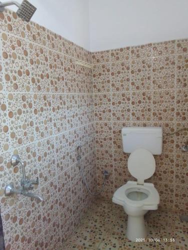 Ένα μπάνιο στο Shree Sadguru Krupa Guest House