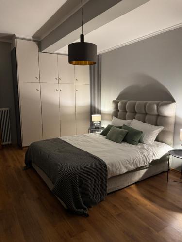 Ένα ή περισσότερα κρεβάτια σε δωμάτιο στο Elathea Guest House