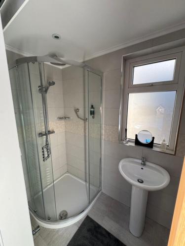 Phòng tắm tại Charlie Óg's Bridge House