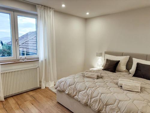 Postel nebo postele na pokoji v ubytování Urlaub im bayerischen Wald