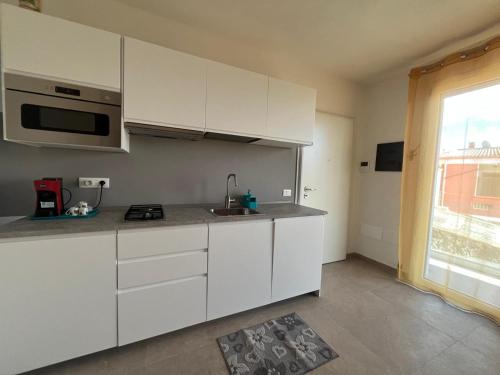 Η κουζίνα ή μικρή κουζίνα στο Casa Via Marconi