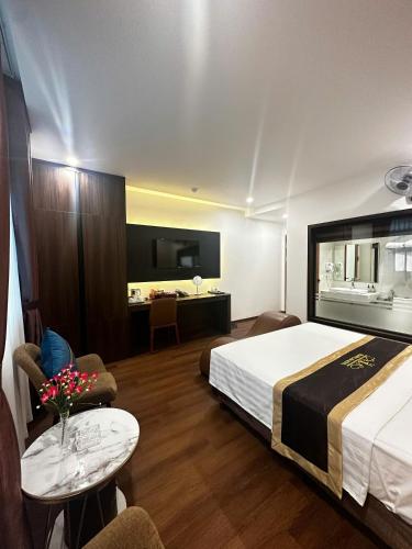 En eller flere senge i et værelse på THANH LAM Hotel - KĐT Xala- Hà Đông