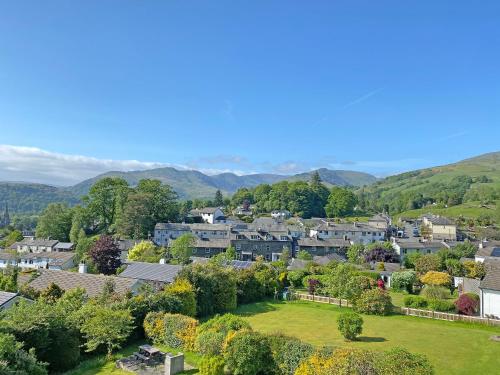 an aerial view of a town with houses and trees at Badgers Rake 12 Squirrels Nest in Ambleside