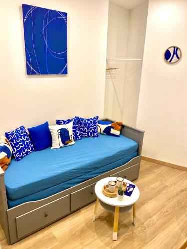 Ένα ή περισσότερα κρεβάτια σε δωμάτιο στο Studio charmant au cœur de Perigueux