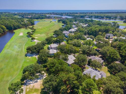 an aerial view of a golf course with a river and houses at Ruthie's Roost villa by Peace Vacations in Georgetown