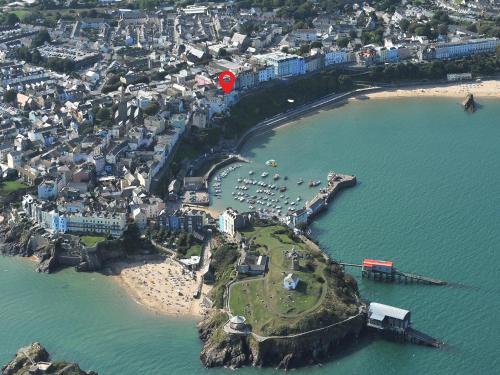 an aerial view of a small island in the water at Ty Mair in Tenby