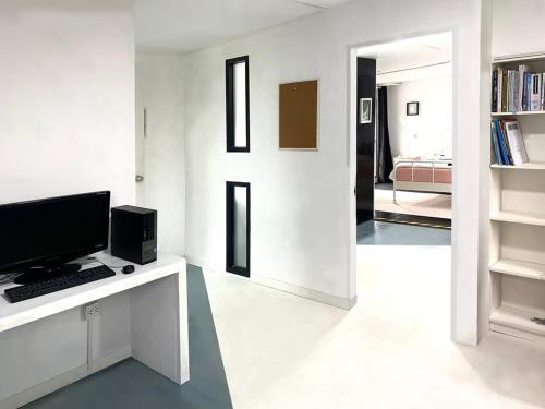 TV a/nebo společenská místnost v ubytování AkkHouse