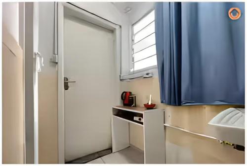 Ένα ή περισσότερα κρεβάτια σε δωμάτιο στο Avenida Paulista Quarto Privado Independente