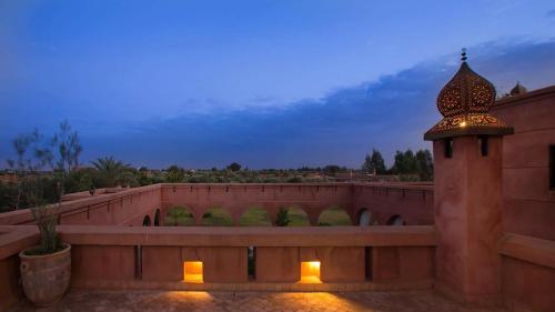a building with a clock tower on top of it at Ksar Salha in Marrakech