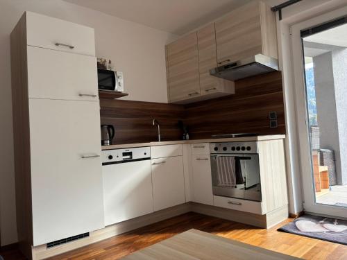 Kuchyň nebo kuchyňský kout v ubytování Bergzauber Appartement Stubai