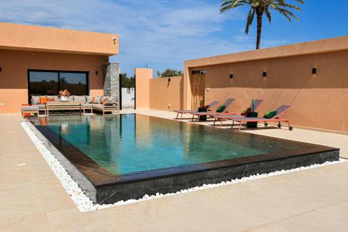 Bazén v ubytování Villa djerba laguna nebo v jeho okolí