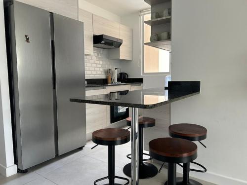 Kuchyň nebo kuchyňský kout v ubytování Charming Apartment in Curridabat