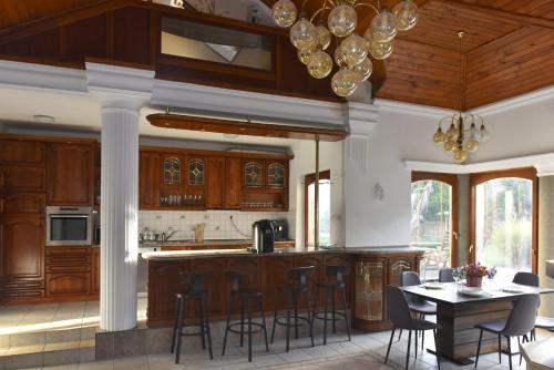 Kuchyň nebo kuchyňský kout v ubytování Erdőparty Vendégház