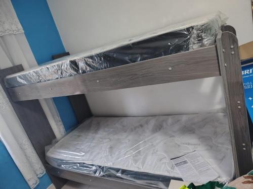 Letto o letti a castello in una camera di Kitão Caiçara