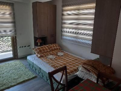 Postel nebo postele na pokoji v ubytování Ski Apartmani Elena