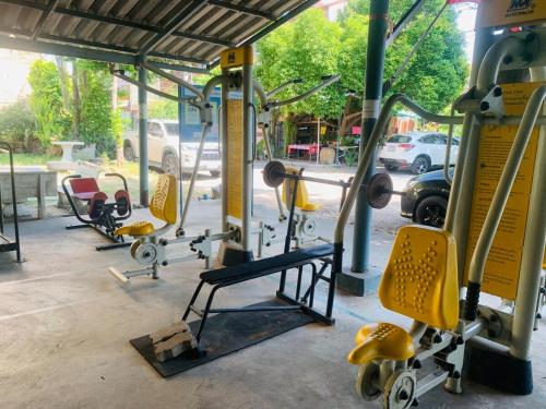 a group of gym equipment on a bus at Palmhouse studio room in Bang Khen