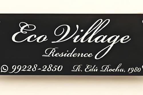 a chalkboard sign for a la village restaurant at Sobrado 2 amplo e confortável em condomínio in Corumbá