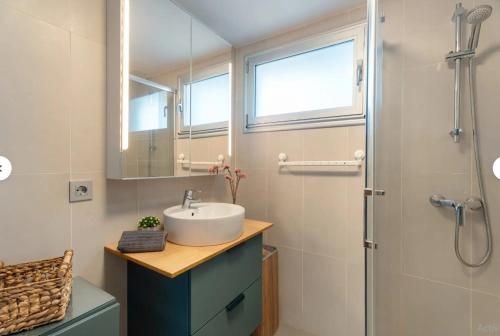 a bathroom with a sink and a shower at Tejita Beach in La Tejita
