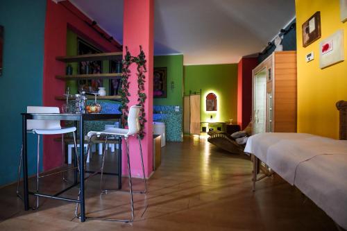 Postel nebo postele na pokoji v ubytování Suite con SPA Privata - Hotel Riva Etrusca