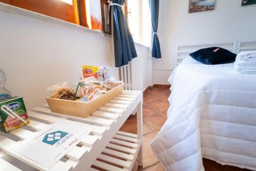 En eller flere senge i et værelse på Il Cantico Home