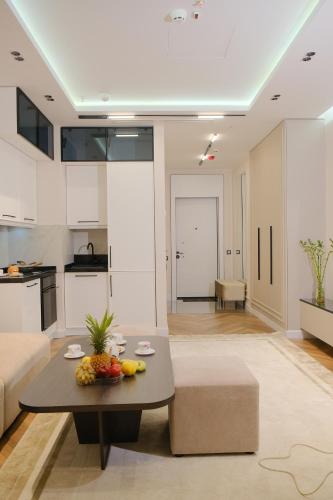 Kuchyň nebo kuchyňský kout v ubytování Nest One Luxe, Элитные апартаменты с балконом и видом на фонтан Tashkent City Park 110