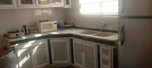 Kuchyň nebo kuchyňský kout v ubytování WaterMill House