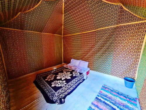 Ένα ή περισσότερα κρεβάτια σε δωμάτιο στο Camp sahara ayour