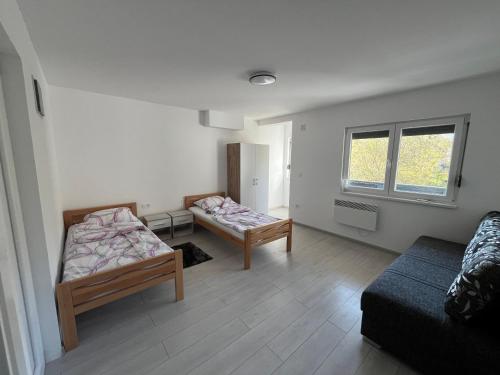 Posezení v ubytování Aqua Rooms Ribnik