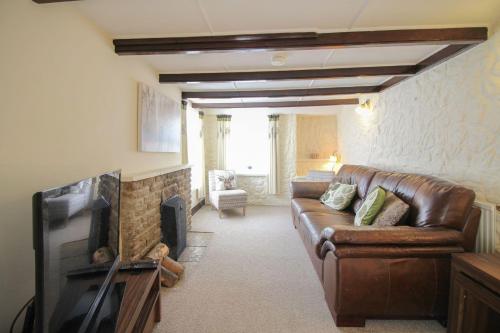 Et opholdsområde på Sunny Corner Cottage