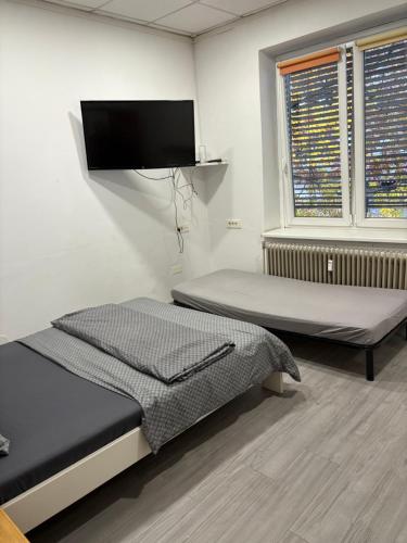 Ένα ή περισσότερα κρεβάτια σε δωμάτιο στο Industrial studio 5