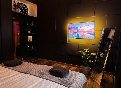 Postel nebo postele na pokoji v ubytování Cozy Mood Apartment in Old Town