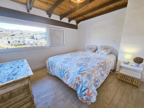 Voodi või voodid majutusasutuse Les pieds dans Lot toas