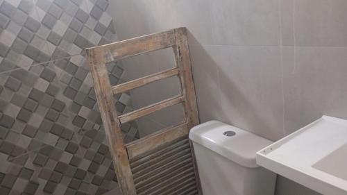 Et badeværelse på Suíte quase frente à rodoviária