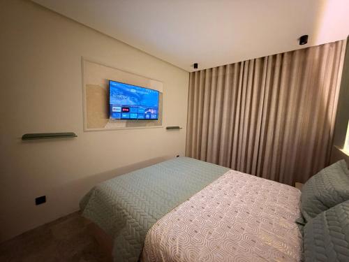 Ένα ή περισσότερα κρεβάτια σε δωμάτιο στο CityZen