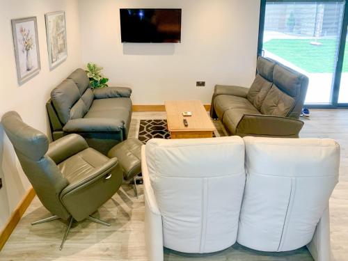 Posezení v ubytování Dronefield Lodge