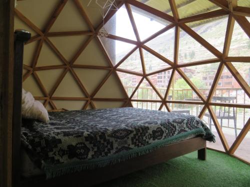 Postel nebo postele na pokoji v ubytování Coca Runa Wasi Hostel