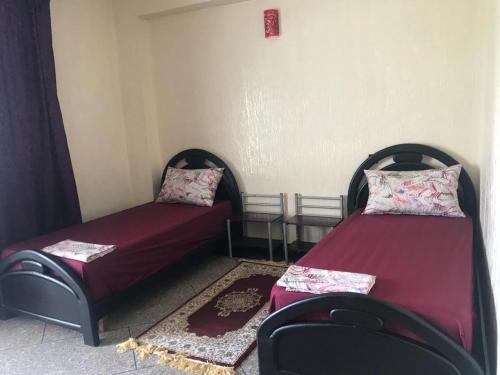 Postel nebo postele na pokoji v ubytování Houria’s Appt